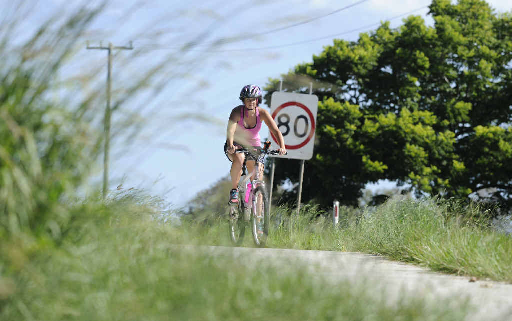 RIDING CAREFILLY: Grafton cyclist Sophie Attwater riding along the Summerland Way at Junction Hill near where she came across a snake on the path. RIDING CAREFILLY: Grafton cyclist Sophie Attwater riding along the Summerland Way at Junction Hill near where she came across a snake on the path.